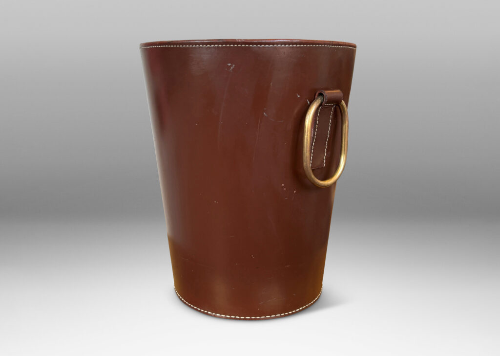 Gallery BAC tapered form in stitched cognac tinted leather with decorative oval ring