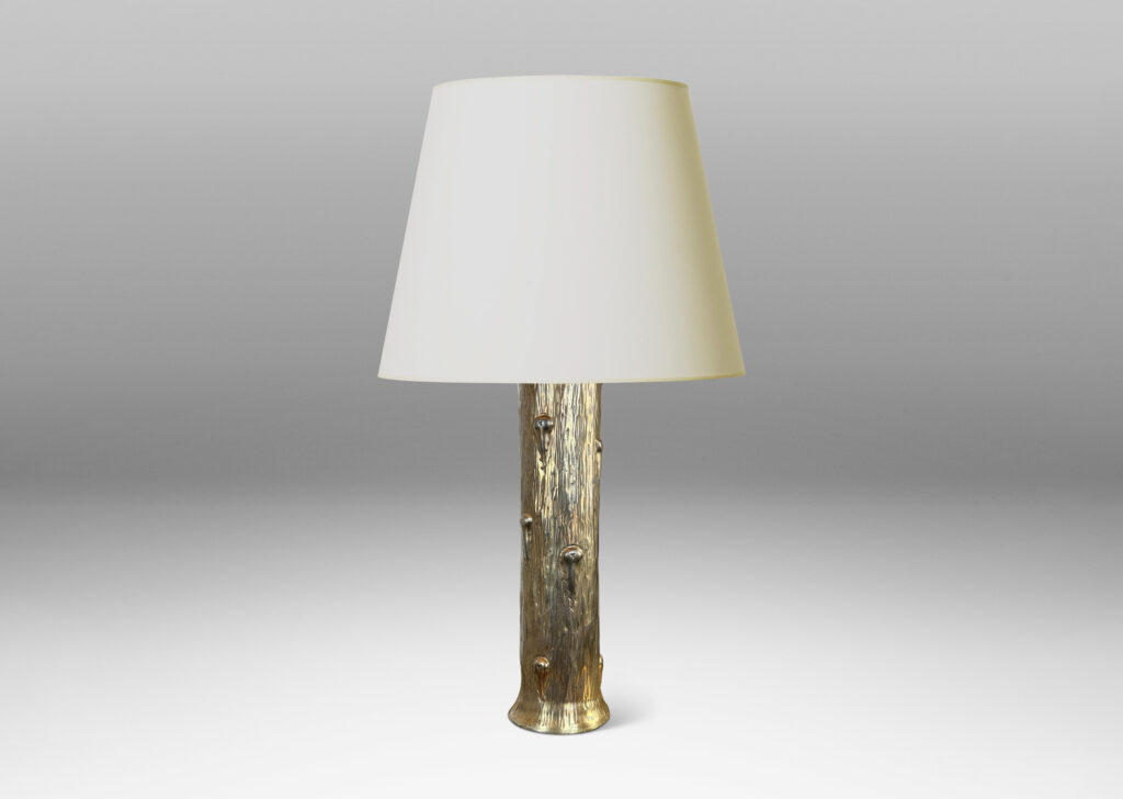 Gallery BAC columnar form with flared top and base, featuring a hand-hammered repoussé organically modeled texture; brass