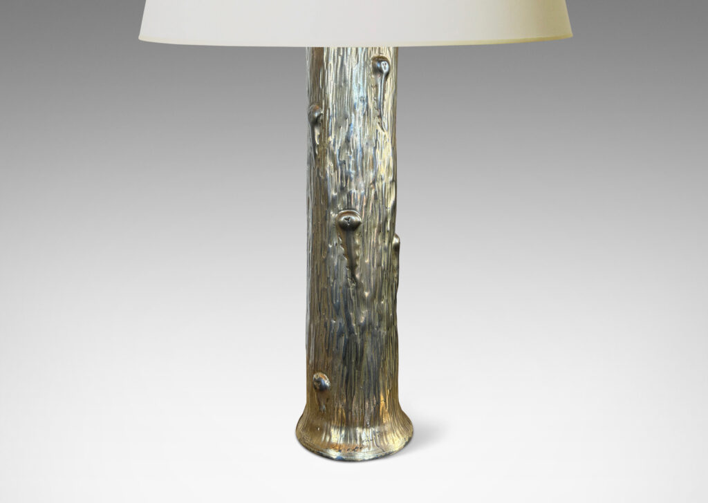 Gallery BAC columnar form with flared top and base, featuring a hand-hammered repoussé organically modeled texture; brass