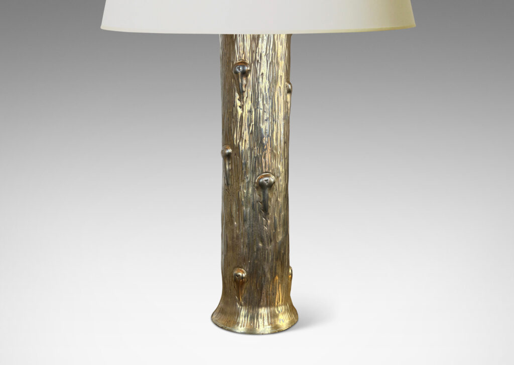 Gallery BAC columnar form with flared top and base, featuring a hand-hammered repoussé organically modeled texture; brass