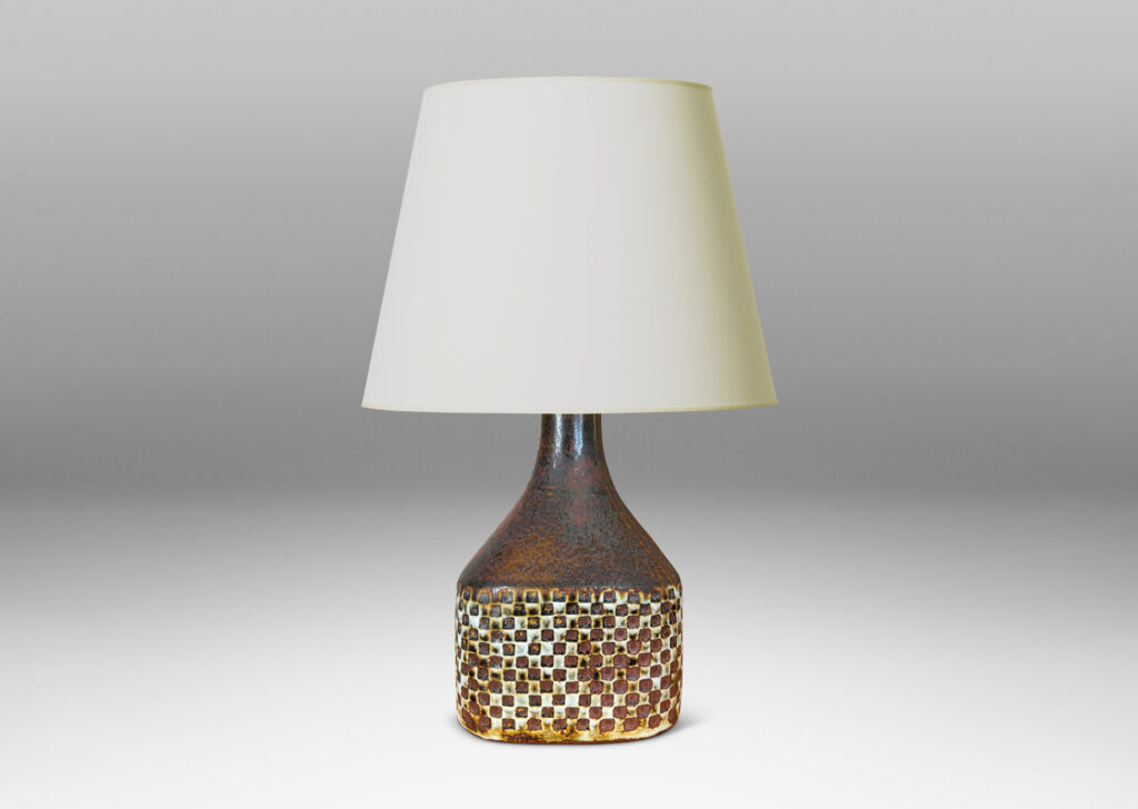 Gallery BAC square bottle-like form with checker relifs and sprouting neck, glazed in pale gray and oxblood-black