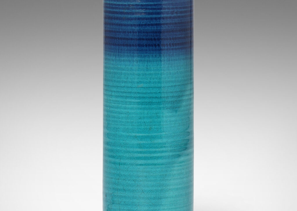 Gallery BAC ridged cylindrical form with blue-turquoise glaze; earthenware with brass mount