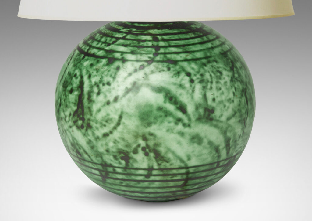 Gallery BAC globe form with carved pinstripe band details, glazed in a malachite-evoking rag rolled green glaze