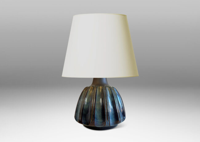 Gallery BAC large organically modeled rounded form with vertical flutes glazed in blue luster and shoulders in matte brown