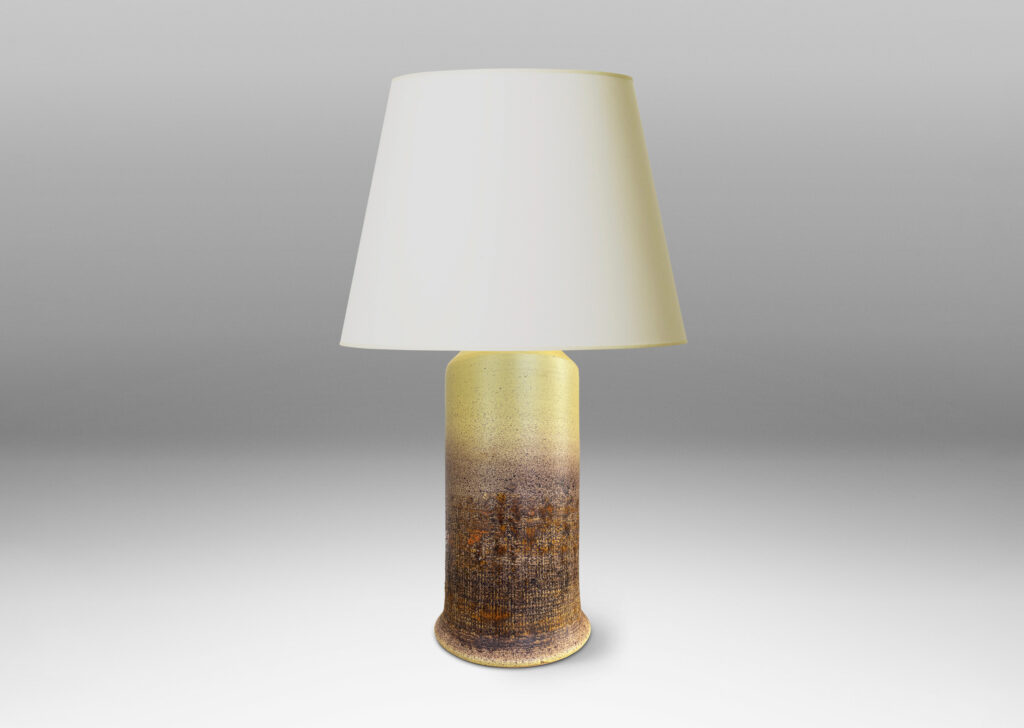 Gallery BAC cylindrical form with conical top and scored burlap-like texture on the lower half, glazed in a mellow yellow with splattered brown