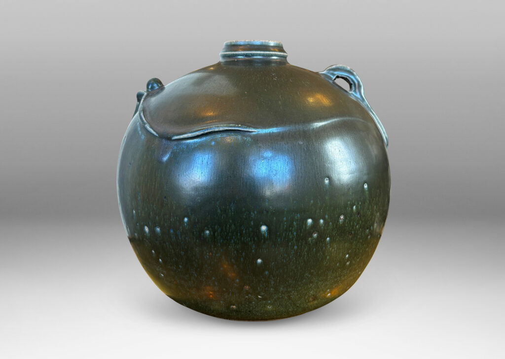 Gallery BAC globe form with plant-like sculpted details, glazed in a deep green tone