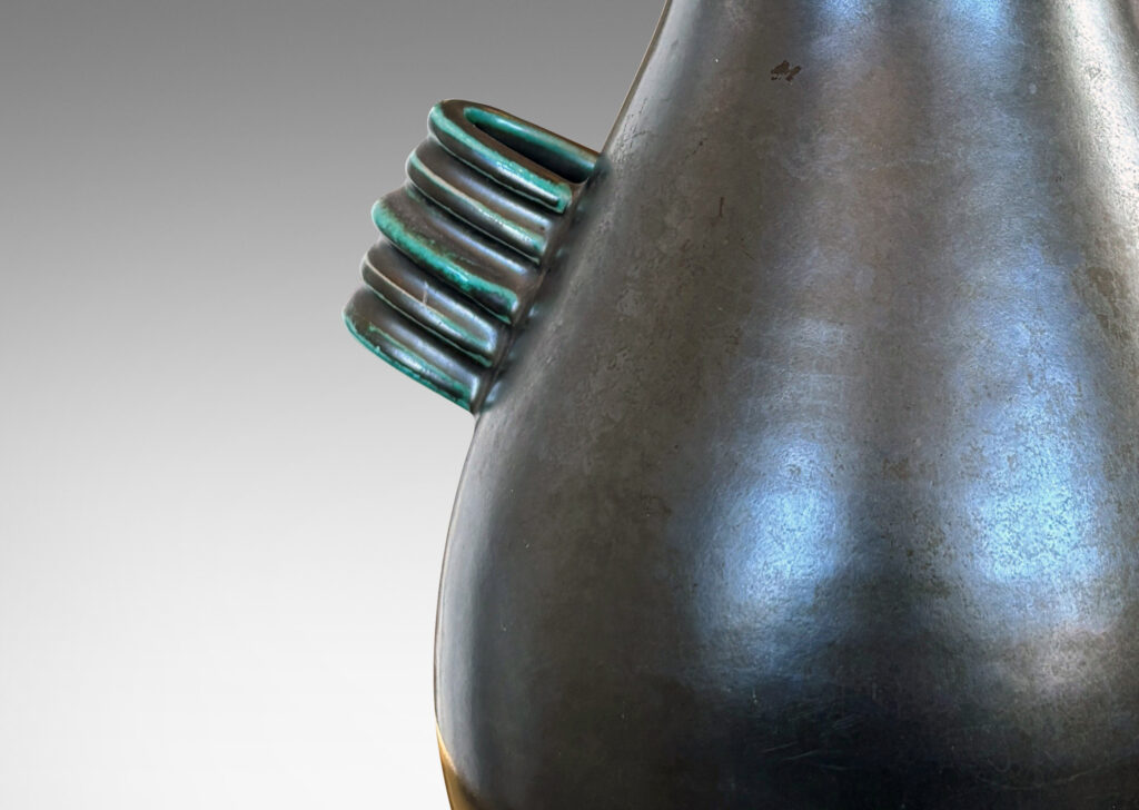 Gallery BAC swelling form with wide neck and ridged handles in a tonal teal green glaze