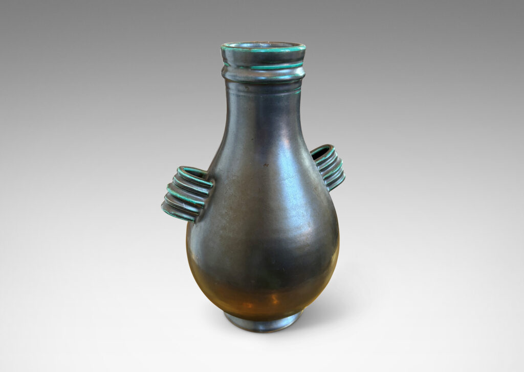 Gallery BAC swelling form with wide neck and ridged handles in a tonal teal green glaze