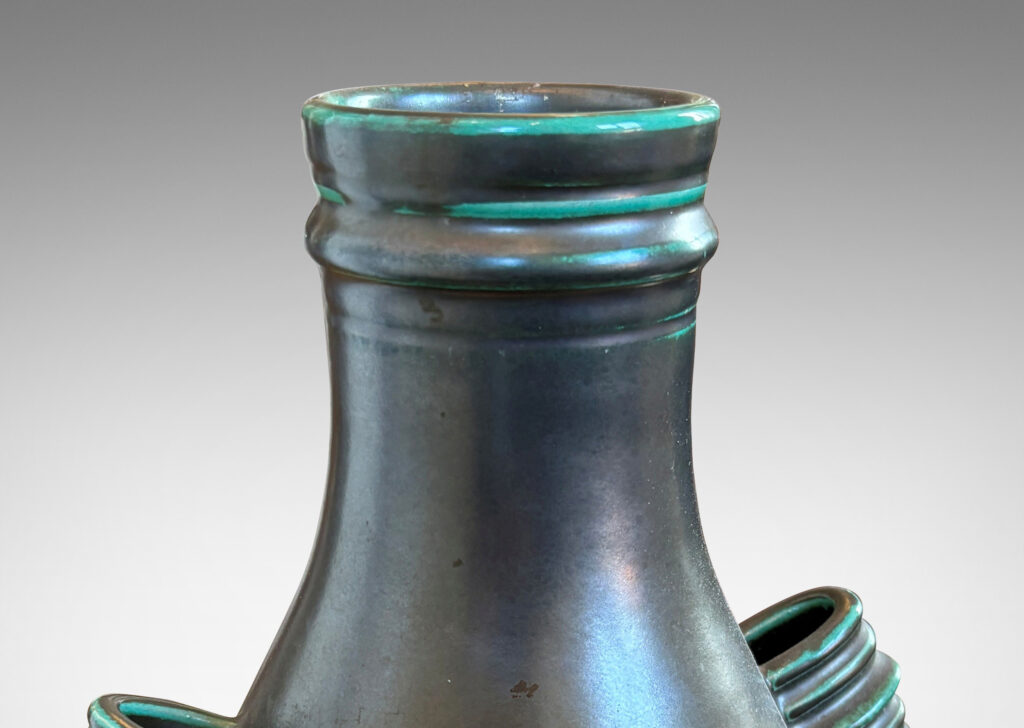 Gallery BAC swelling form with wide neck and ridged handles in a tonal teal green glaze