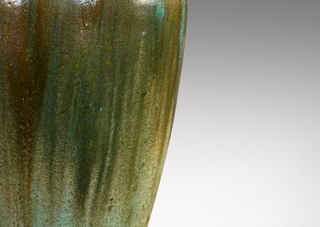 Gallery BAC sinuously modeled tapering form glazed in flowing olive, jungle and celadon green glazes