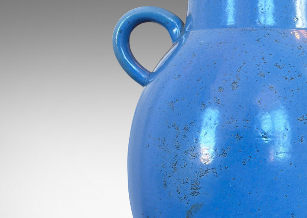 Gallery BAC tapered ovoid form with wide mouth and arc handles, glazed in a light cornflower blue