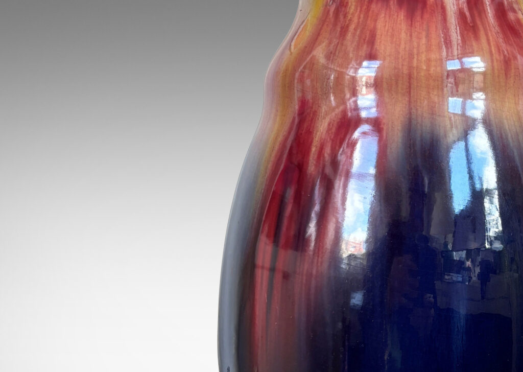 Gallery BAC undulating silhouette, glazed in flowing burgundy, apricot and purple