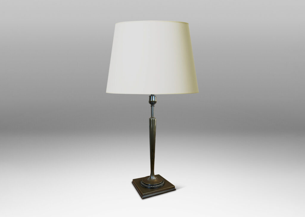 Gallery BAC torch form with tapered and fluted stand, mitered square base, and rings of beading; patinated bronze