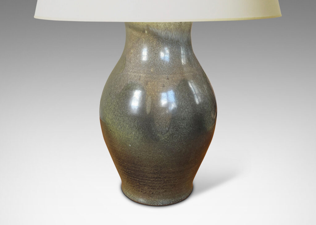 Gallery BAC swelling form in a moody green-gray glaze, with a bespoke tiered mount and harp; stoneware and bronze