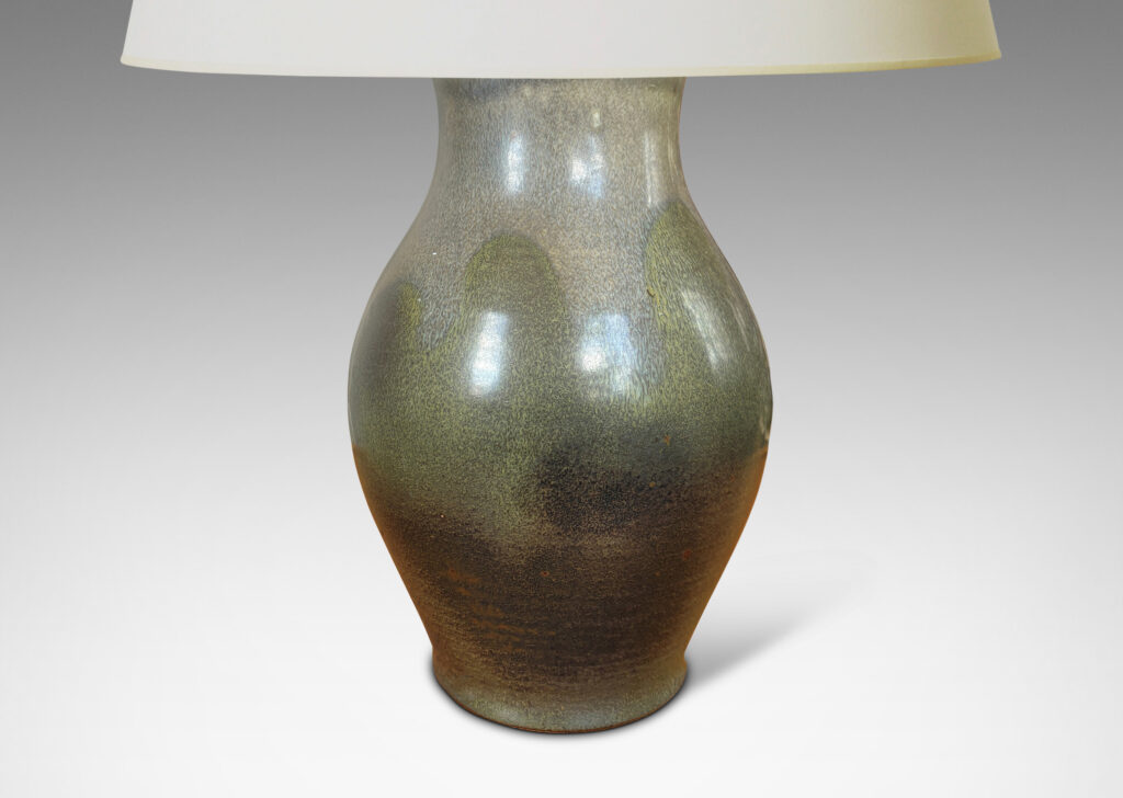 Gallery BAC swelling form in a moody green-gray glaze, with a bespoke tiered mount and harp; stoneware and bronze