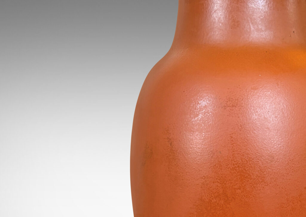 Gallery BAC ovoid form glazed in a warm burnt sienna; stoneware