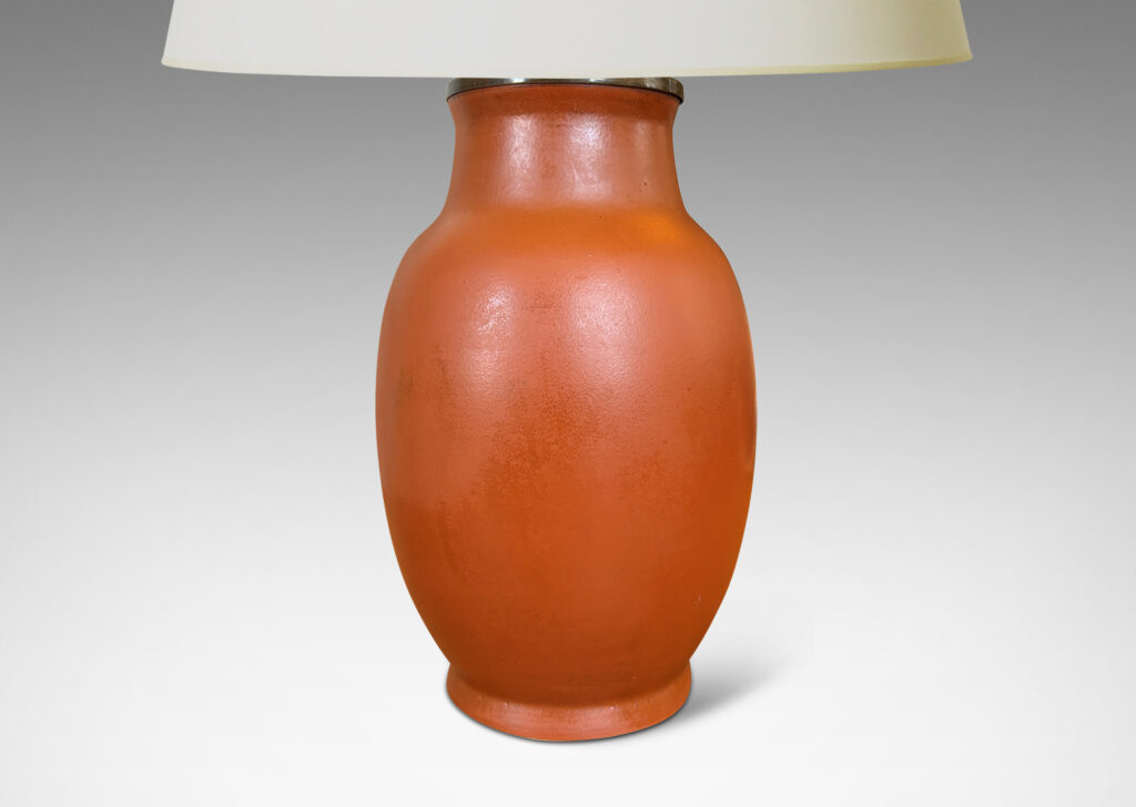 Gallery BAC ovoid form glazed in a warm burnt sienna; stoneware