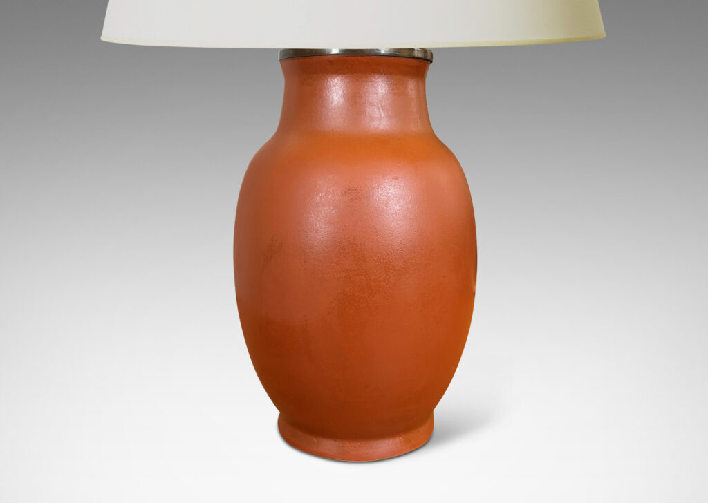 Gallery BAC ovoid form glazed in a warm burnt sienna; stoneware
