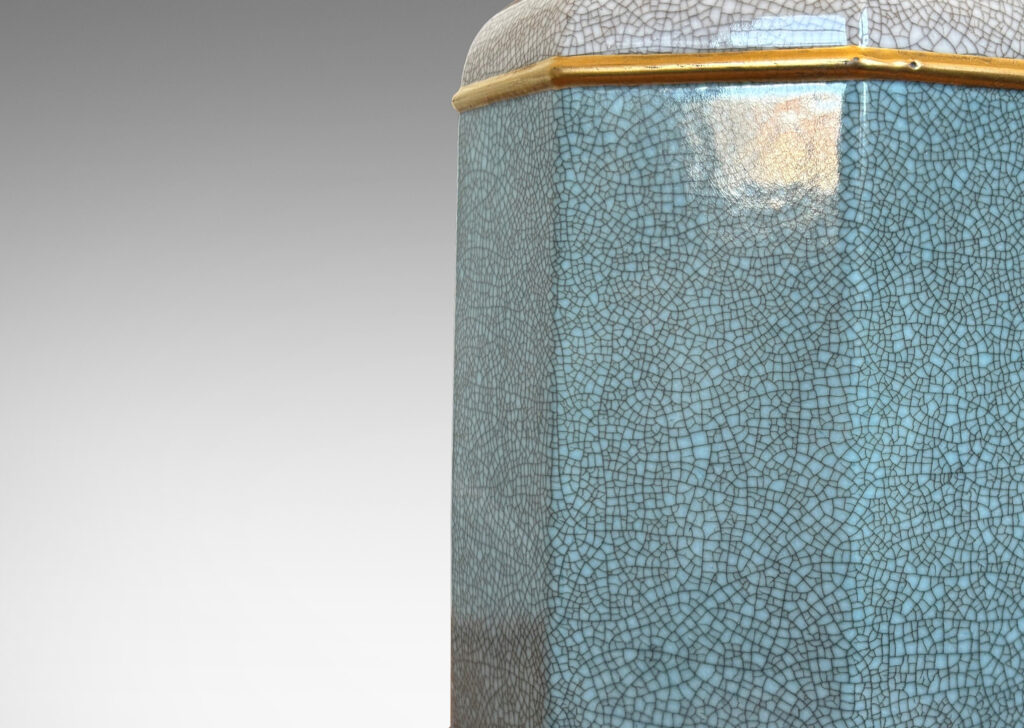 Gallery BAC eight-sided form glazed in white-gray and pale turquoise, with gilded band accents; porcelain