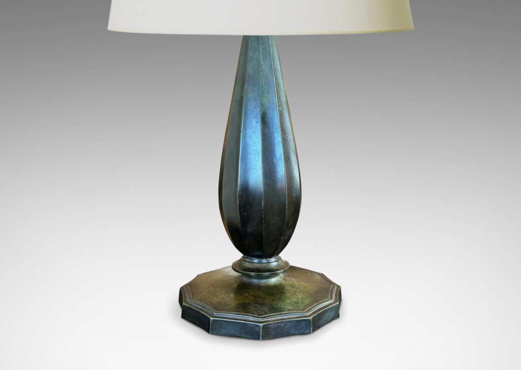 Gallery BAC large fluted drop form on a disk base; Disko alloy with bronze-evoking patination