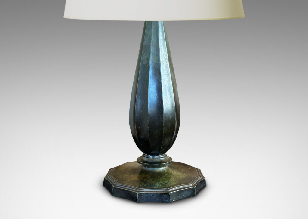Gallery BAC large fluted drop form on a disk base; Disko alloy with bronze-evoking patination