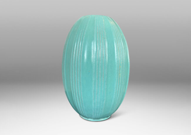 Gallery BAC ovoid form with ridged bands, glazed in a light blue-celadon tone