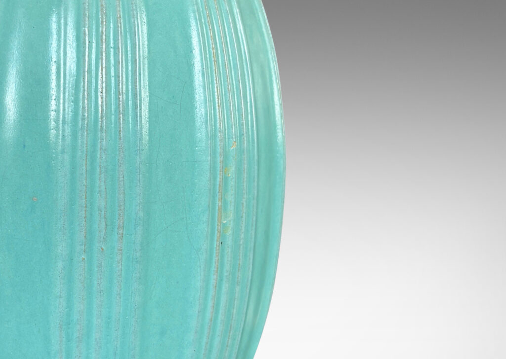 Gallery BAC ovoid form with ridged bands, glazed in a light blue-celadon tone