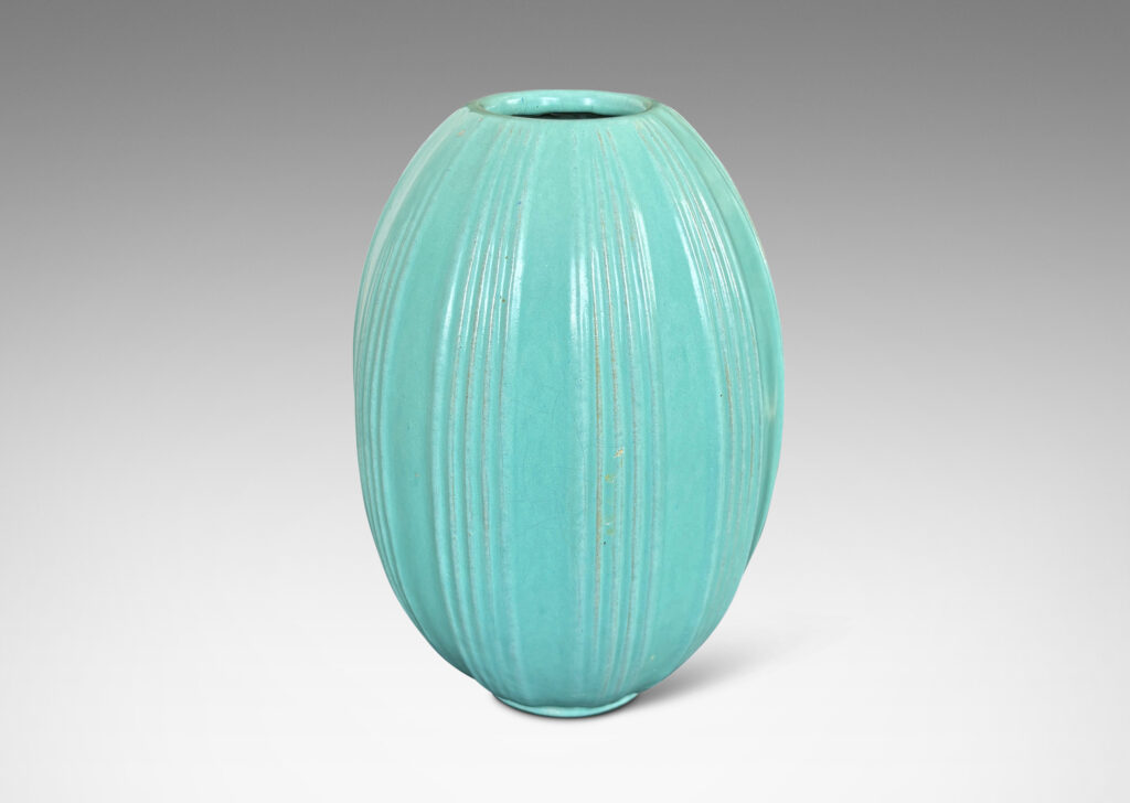 Gallery BAC ovoid form with ridged bands, glazed in a light blue-celadon tone