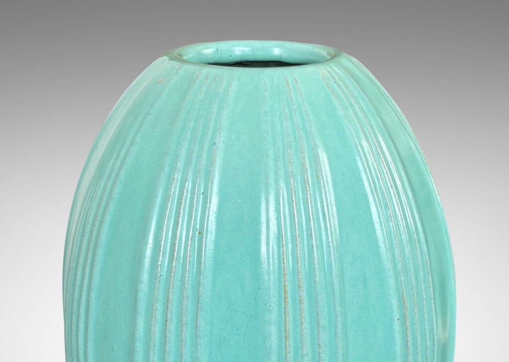 Gallery BAC ovoid form with ridged bands, glazed in a light blue-celadon tone