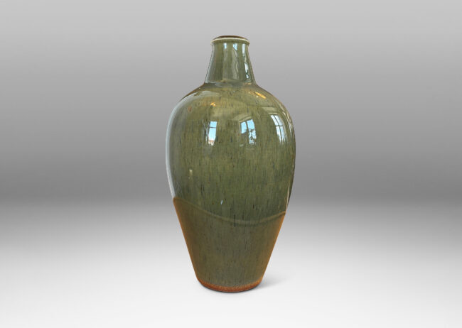 Gallery BAC tapered form with sprouting neck, glazed in a mossy green with gold-tan undertones