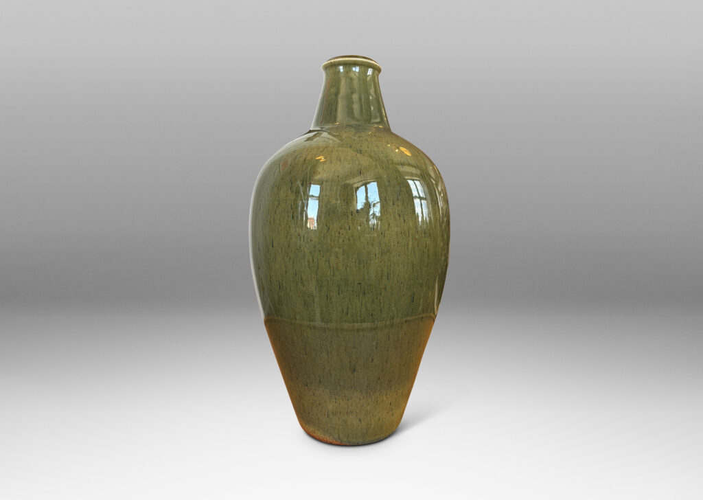 Gallery BAC tapered form with sprouting neck, glazed in a mossy green with gold-tan undertones