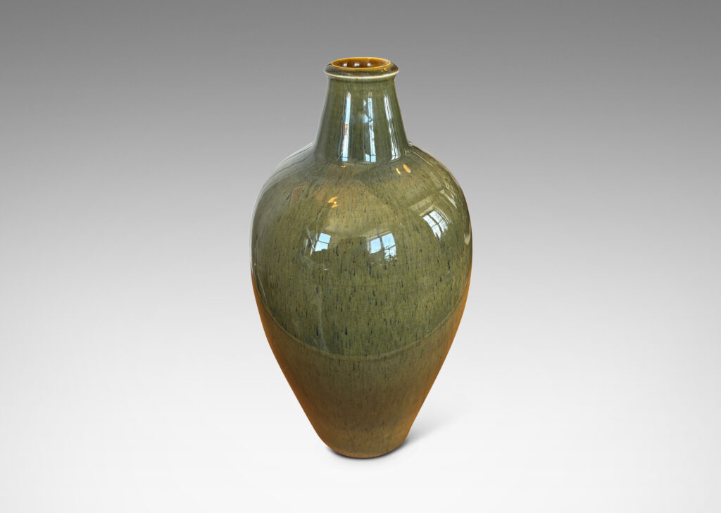 Gallery BAC tapered form with sprouting neck, glazed in a mossy green with gold-tan undertones
