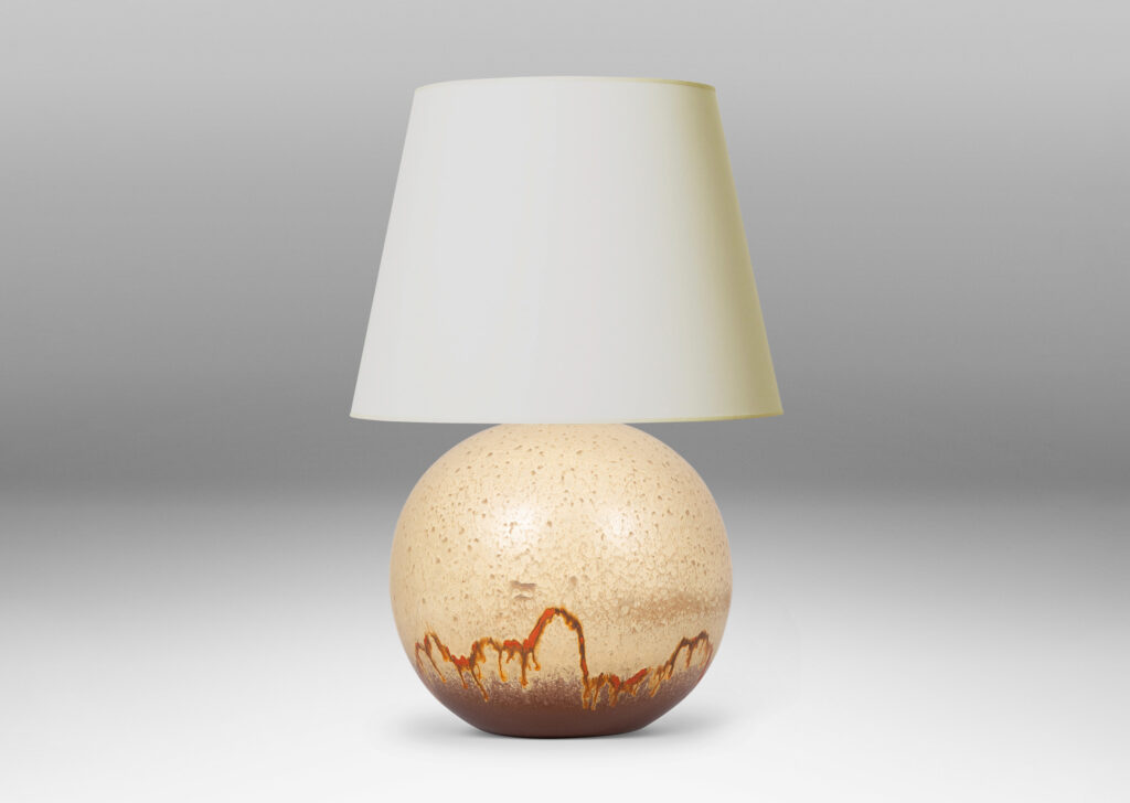 Gallery BAC globe form glazed in a pale taupe and brown, with a dripping line of orange