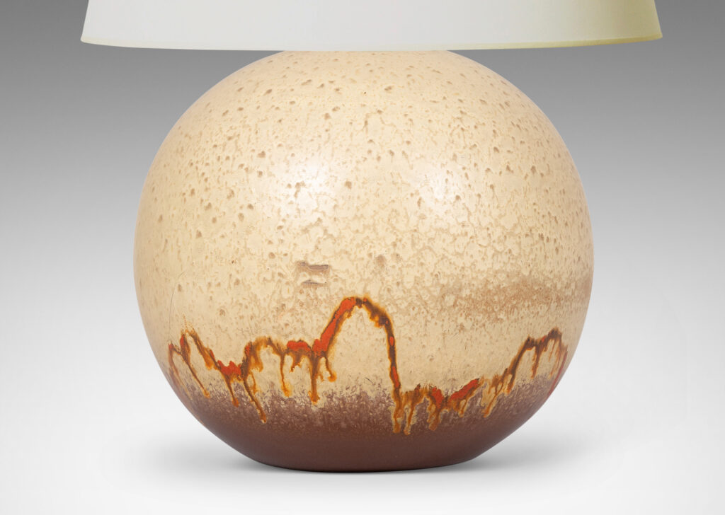 Gallery BAC globe form glazed in a pale taupe and brown, with a dripping line of orange