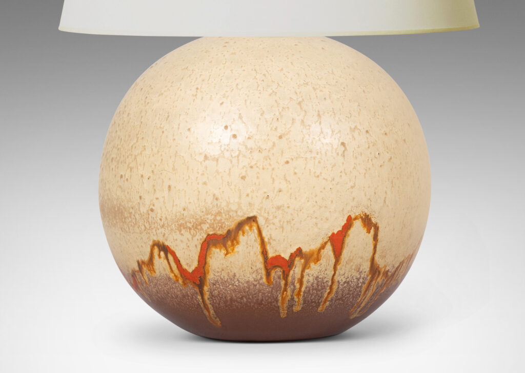 Gallery BAC globe form glazed in a pale taupe and brown, with a dripping line of orange