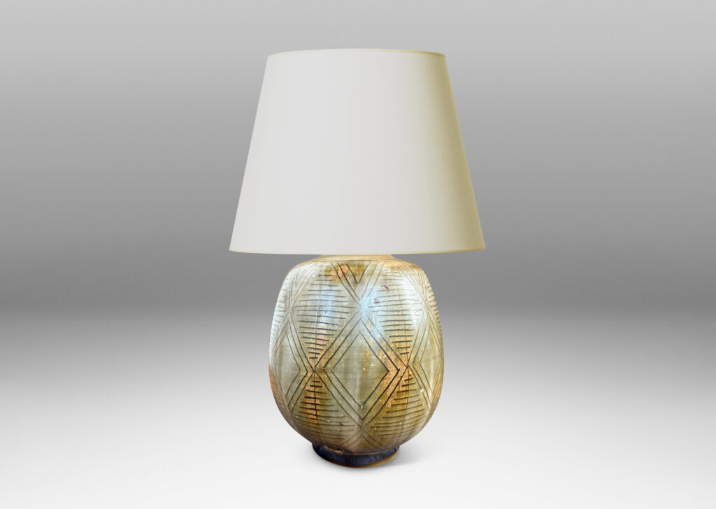 Gallery BAC swelling ovoid form carved with a diamond pattern design and gold-gray glaze wash