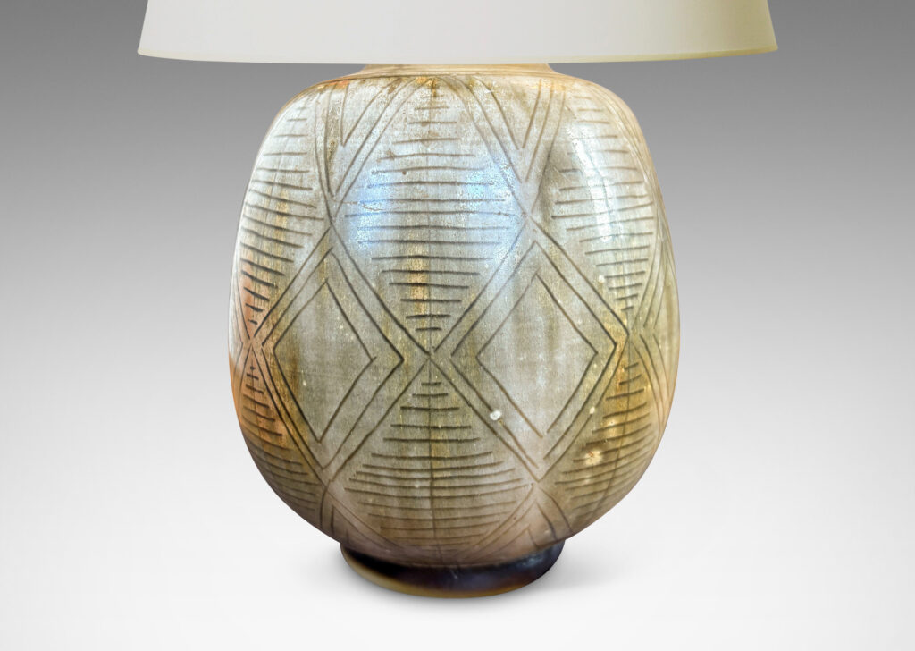 Gallery BAC swelling ovoid form carved with a diamond pattern design and gold-gray glaze wash