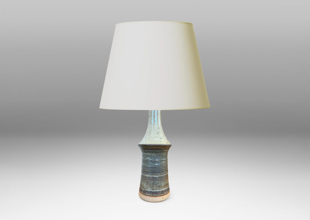Gallery BAC organically modeled tiered form glazed in a speckled pale gray on top and flowing bands in gray tones below