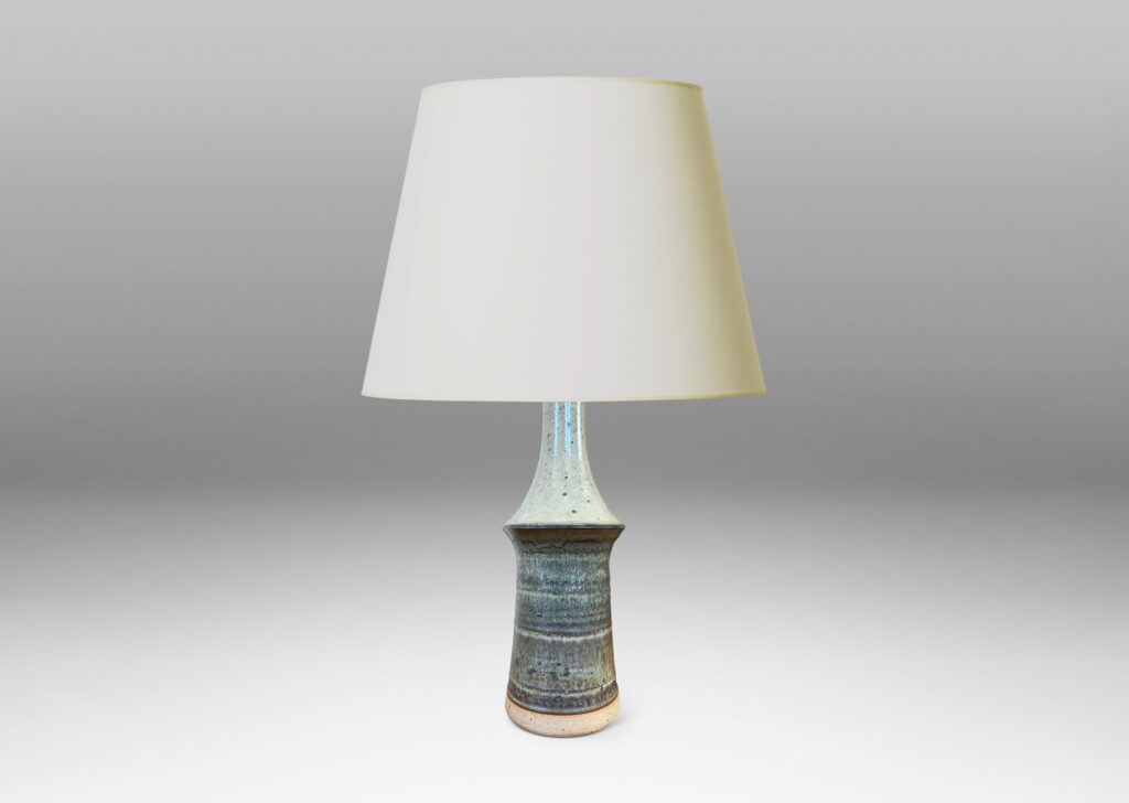 Gallery BAC organically modeled tiered form glazed in a speckled pale gray on top and flowing bands in gray tones below