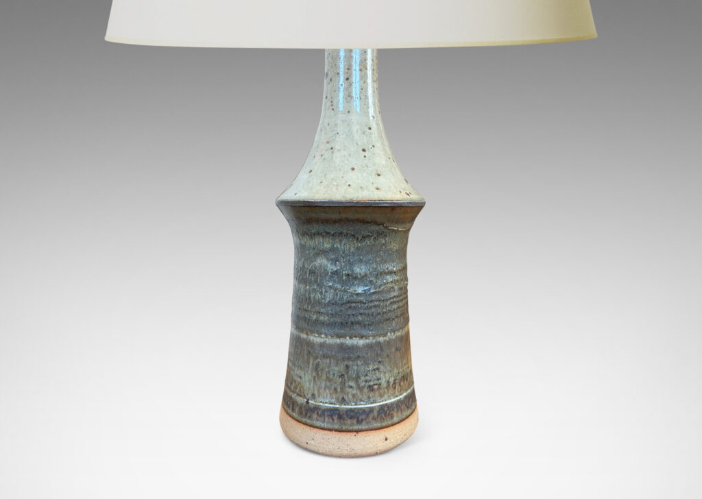Gallery BAC organically modeled tiered form glazed in a speckled pale gray on top and flowing bands in gray tones below