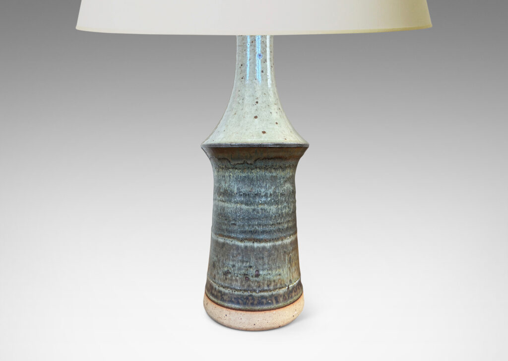 Gallery BAC organically modeled tiered form glazed in a speckled pale gray on top and flowing bands in gray tones below