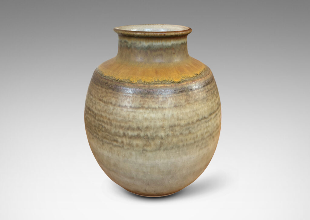 Gallery BAC ovoid form with coved neck, glazed in a watery green-gray with tan highlight circling the shoulders