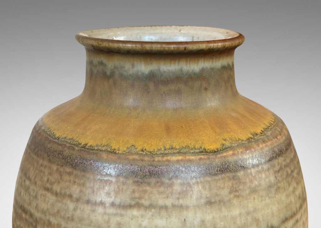 Gallery BAC ovoid form with coved neck, glazed in a watery green-gray with tan highlight circling the shoulders