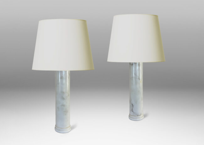 Gallery BAC cylindrical form with stepped disk plinth; lathed solid marble in white with gray graining