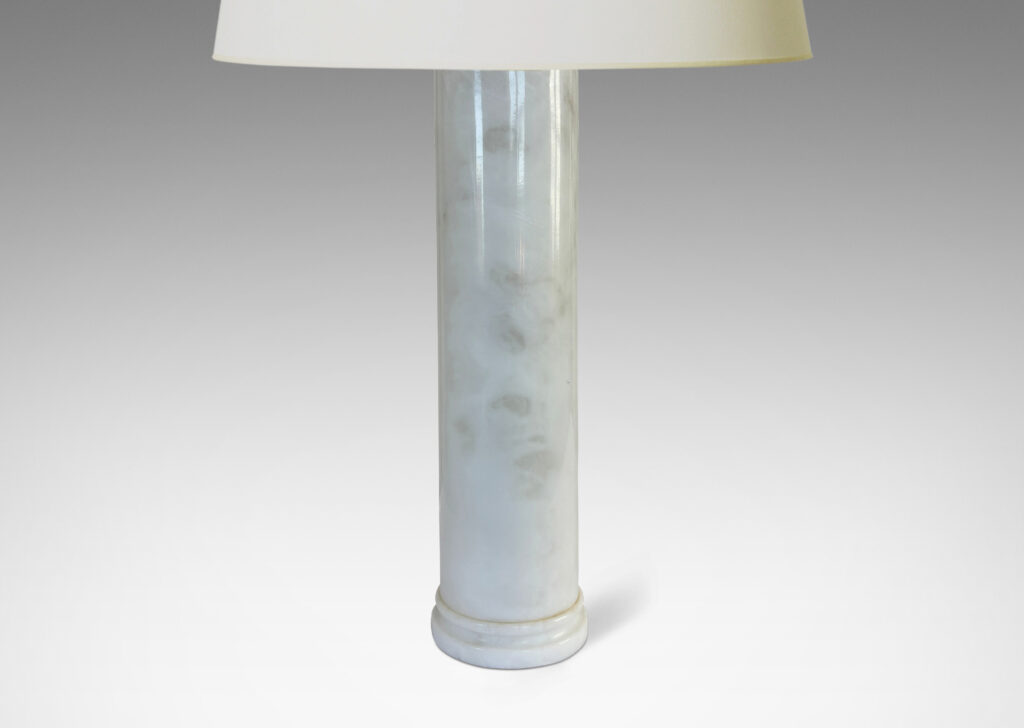 Gallery BAC cylindrical form with stepped disk plinth; lathed solid marble in white with gray graining
