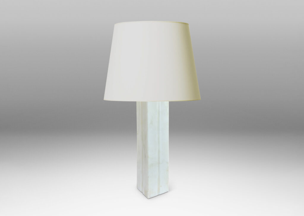Gallery BAC square pillar form with vertical carved bands on each face; lathed solid marble in white with gray graining