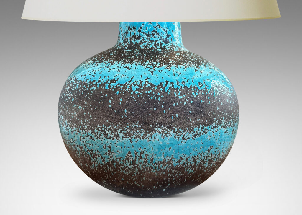 Gallery BAC dynamically modeled tapering spherical form, glazed in ethereal turquoise stripes against matte gray