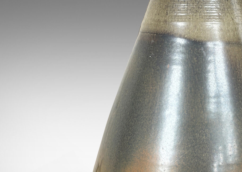 Gallery BAC large upwardly tapering form and outstretched mouth, glazed in gray and brown tones
