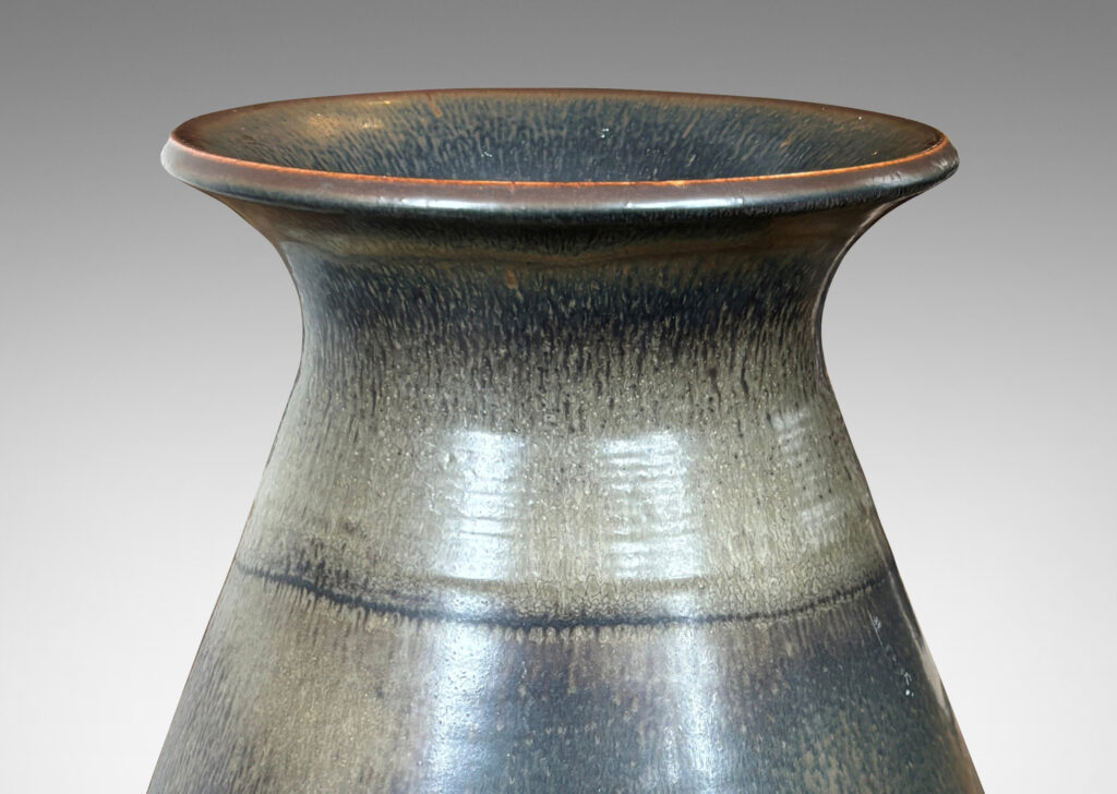 Gallery BAC large upwardly tapering form and outstretched mouth, glazed in gray and brown tones