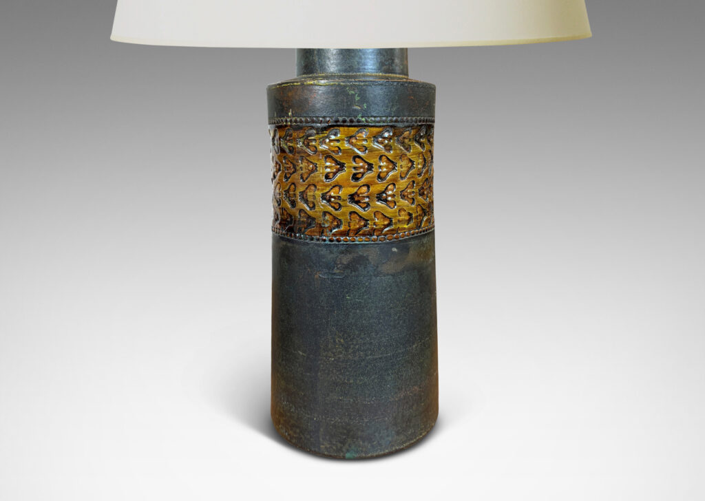 Gallery BAC rationalized canister form in matte brown, with wide bands with impressed ornaments glazed in a gloss coffee brown